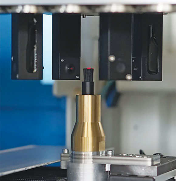 Figure 4. Cross sensor for wave height control and automatic tool measurement.